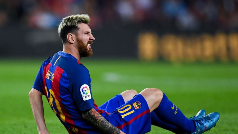 Lionel Messi went down with a groin injury in the second half at the Nou Camp