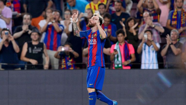 Barcelona's Lionel Messi celebrates scoring the opener against Celtic in the Champions League group stage