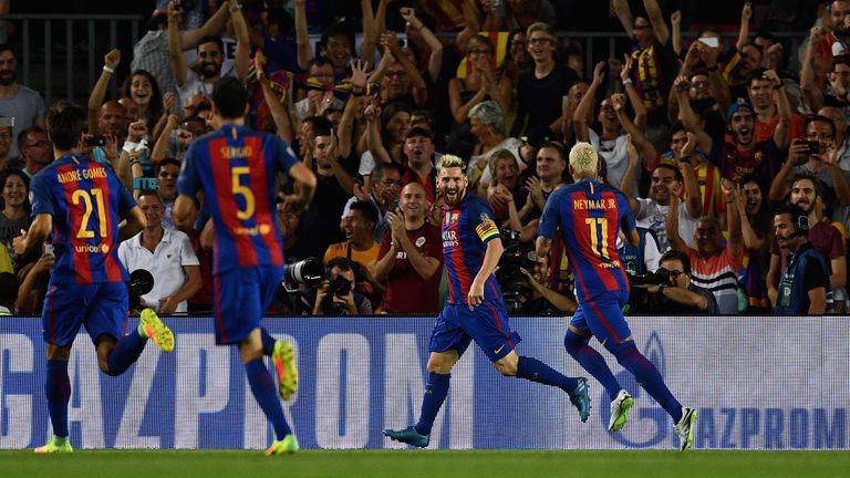 Lionel Messi celebrates after scoring for Barcelona against Celtic
