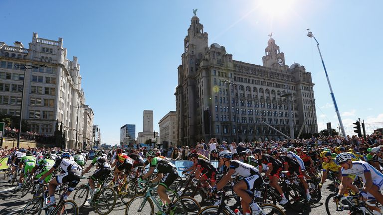 LIVERPOOL, ENGLAND - SEPTEMBER 07:  Marcel Kittel of Germany (181) takes a bend in front of the Liver Building amongst the peloton on his way to victory du