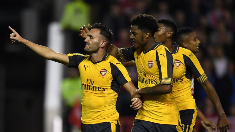 NOTTINGHAM, ENGLAND - SEPTEMBER 20:  Lucas Perez (L) of Arsenal celebrates scoring his team's third goal with Chuba Akpom of Arsenal during the EFL Cup Thi