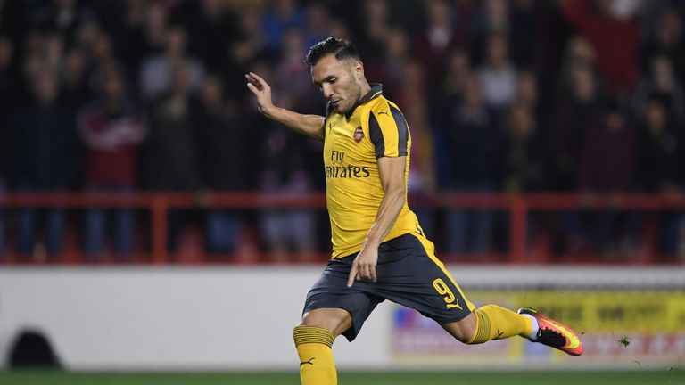 NOTTINGHAM, ENGLAND - SEPTEMBER 20: Lucas Perez of Arsenal scores his sides second goal from the penalty spot during the EFL Cup Third Round match between 