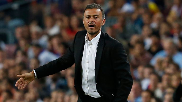 Barcelona's coach Luis Enrique gestures from the sideline during the Spanish league football match FC Barcelona vs Atletico de Madrid at the Camp Nou stadi