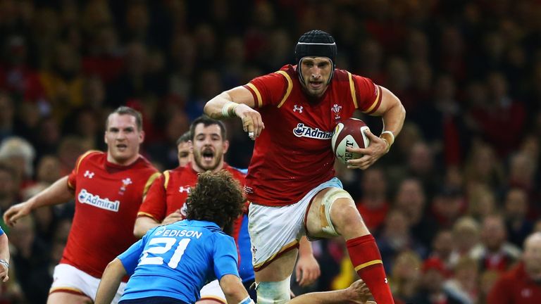 Luke Charteris of Wales charges towards Alberto Lucchese of Italy
