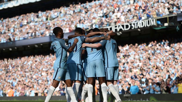 Manchester City players celebrate Kevin De Bruyne's goal