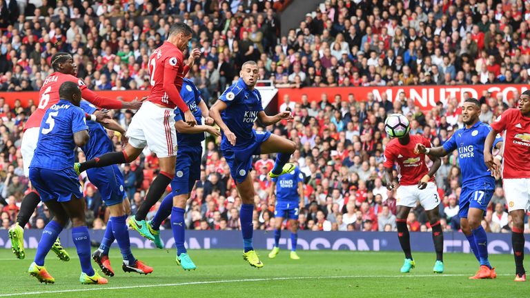 Chris Smalling (4L) opens the scoring for Manchester United at Old Traffford