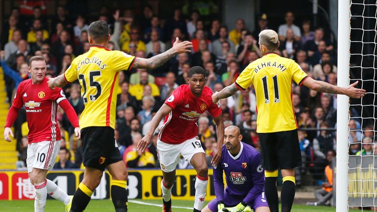 Marcus Rashford (C) scores the equaliser for Manchester United