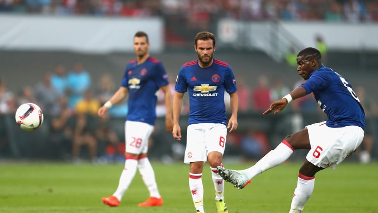 Paul Pogba of Manchester United takes a free kick during the UEFA Europa League Group A match between Feyenoord and Man Utd