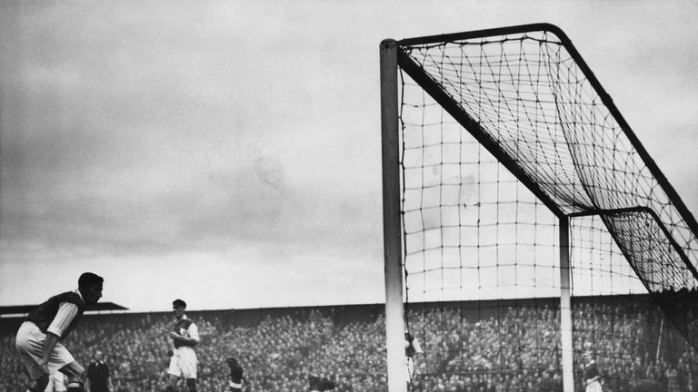 An action shot from Weymouth against Man Utd in the FA Cup third round in 1950, when Gibson was United chairman