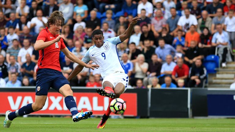 England U21's Marcus Rashford (right) scores his side's first goal of the game during the UEFA Under 21 Euro 2017 Qualifying match at the Community Stadium