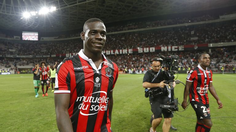 Nice forward Mario Balotelli is all smiles after his debut