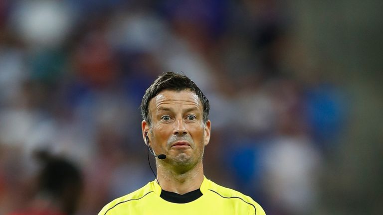 PARIS, FRANCE - JULY 10:  Referee Mark Clattenburg gestures during the UEFA EURO 2016 Final match between Portugal and France at Stade de France on July 10