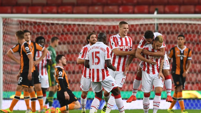 STOKE ON TRENT, ENGLAND - SEPTEMBER 21:  Marko Arnautovic of Stoke City celebrates scoring his sides first goal with team mates during the  EFL Cup Third R