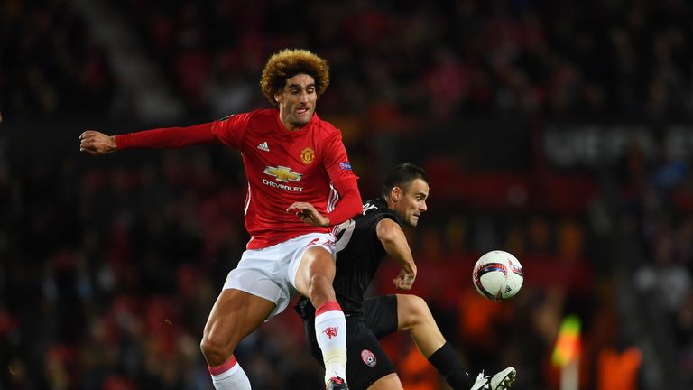 Marouane Fellaini of Manchester United competes with Zeljko Ljubenovic of Zorya Luhansk during the Europa League game at Old Trafford in September 2016