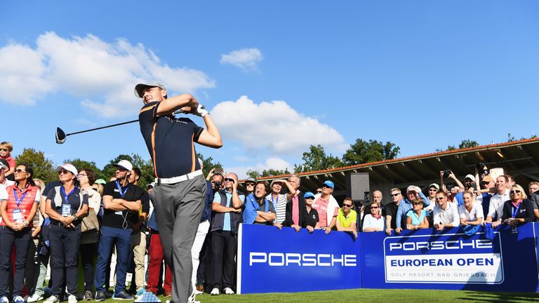 Martin Kaymer of Germany hits a shot during a clinic prior to the start of the Porsche European Open