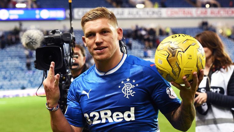 RANGERS v QUEEN OF THE SOUTH  .  IBROX - GLASGOW  .  Rangers' Martyn Waghorn (33) celebrates with the match ball after bagging his hat-trick