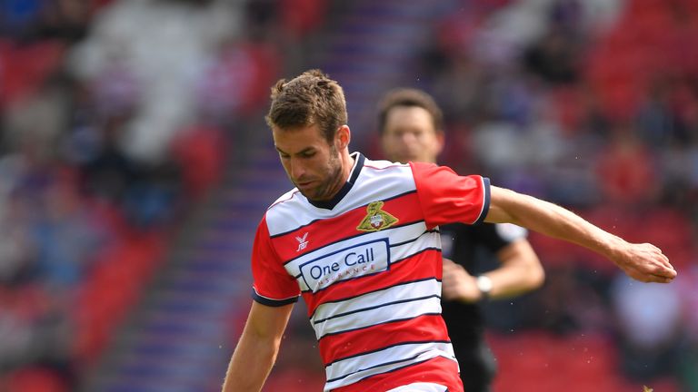 Doncaster Rovers' Matty Blair (right) battles with Middlesbrough's Adam Clayton during the pre-season friendly match at the Keepmoat Stadium, Doncaster.