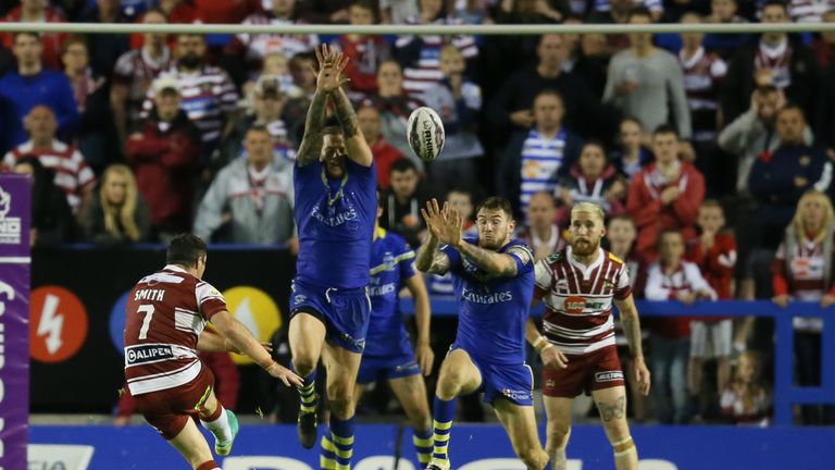 Matty Smith scores the drop goal to take Wigan ahead 