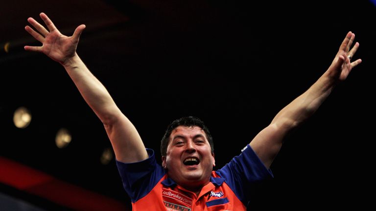 LONDON, ENGLAND - DECEMBER 28:  Mensur Suljovic of Austria celebrates his win against James Wade of England during day 10 in the 2011 Ladbrokes.com World D