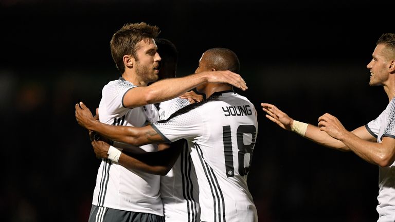 Michael Carrick of Manchester United celebrates scoring his side's first goal against Northampton Town in the EFL Cup third round