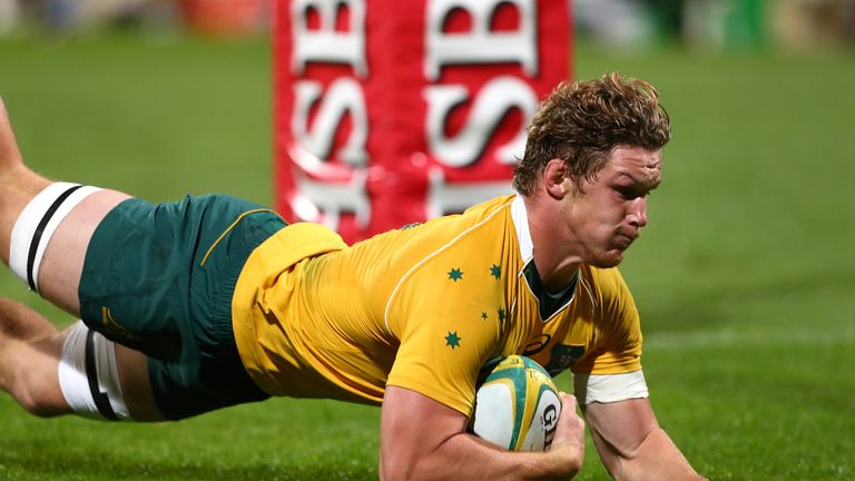 PERTH, AUSTRALIA - SEPTEMBER 17: Michael Hooper of Australia dives for a try during the Rugby Championship match between the Wallabies and Argentina