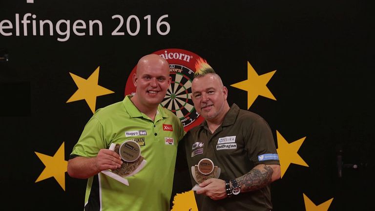 Michael van Gerwen and Peter Wright after the European Darts Grand Prix final