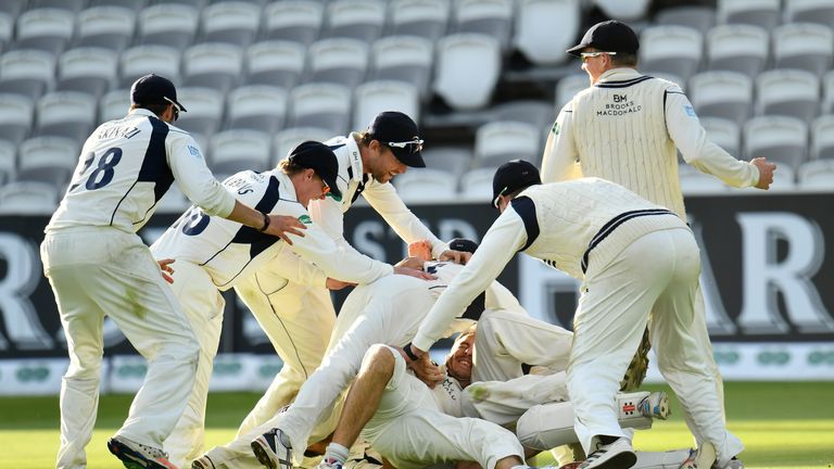 The Middlesex team celebrate victory during day four of the Specsavers County Championship match between Middlesex and Yorkshire