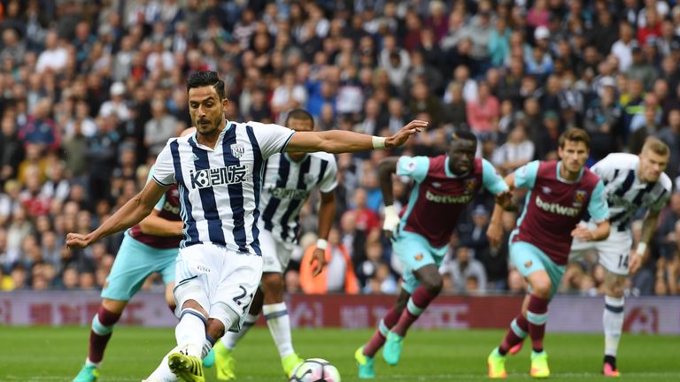 Nacer Chadli of West Brom scores from the penalty spot against West Ham 