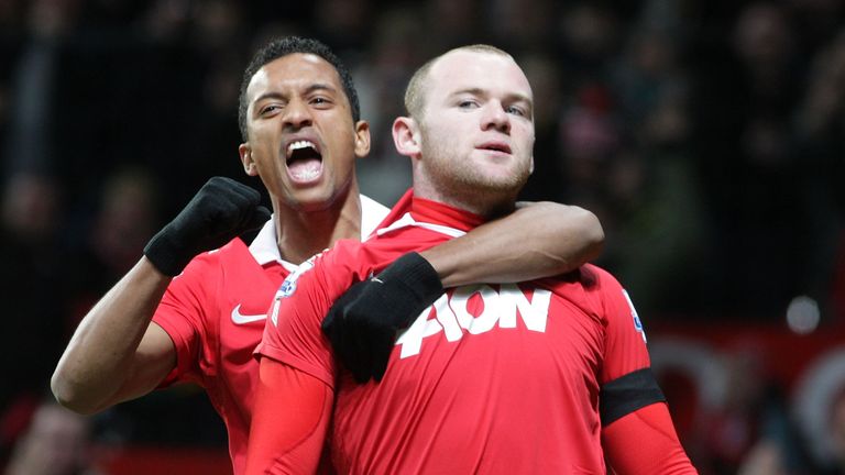 Nani and Wayne Rooney at Old Trafford on February 1, 2011 in Manchester, England.