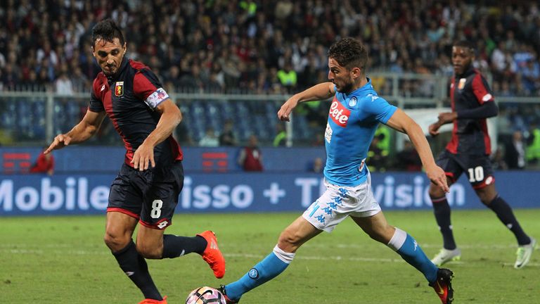 GENOA, ITALY - SEPTEMBER 21:  Dries Mertens (R) of SSC Napoli is challenged by Nicolas Andres Burdisso (L) of Genoa CFC during the Serie A match between Ge