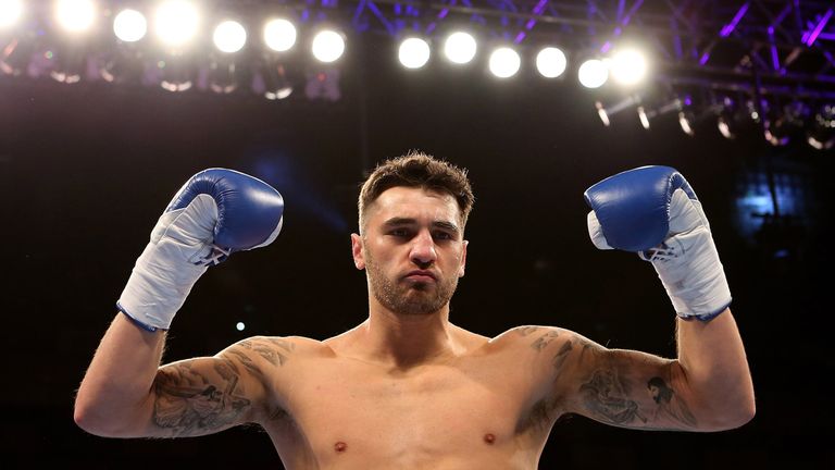 LONDON, ENGLAND - MAY 30:  Nathan Cleverly of Wales celebrates defeating Tomas Man of the Czech Republic in their Light Heavyweight contest at The O2 Arena