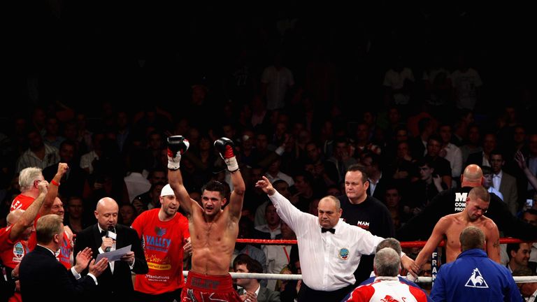  Nathan Cleverly of Wales celebrates victory over Tony Bellew of England after their WBO Light-Heavyweight title fight in Liverpool, October 15, 2011