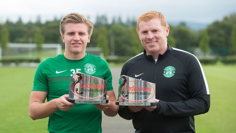 Hibernian duo Jason Cummings and Neil Lennon show off Champioinship awards