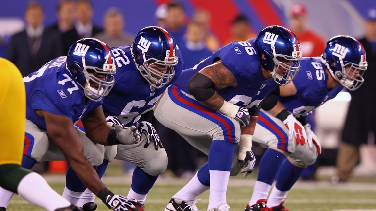 EAST RUTHERFORD, NJ - DECEMBER 04:  Offensive linemen center Kevin Boothe #77, guard Mitch Petrus #62, tackle David Diehl #66 and tight end Jake Ballard #8