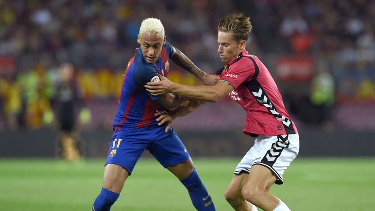 Neymar (L) vies with Raul Garcia, Barcelona v Alaves, La Liga