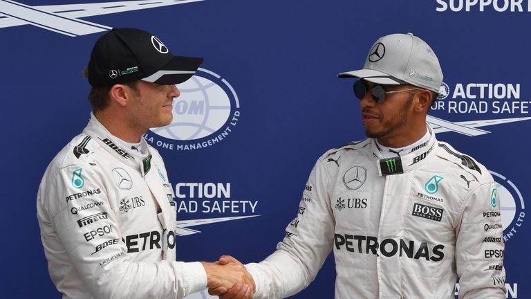 Nico Rosberg and Lewis Hamilton shake hands after Italian Grand Prix qualifying which saw the latter claim pole position