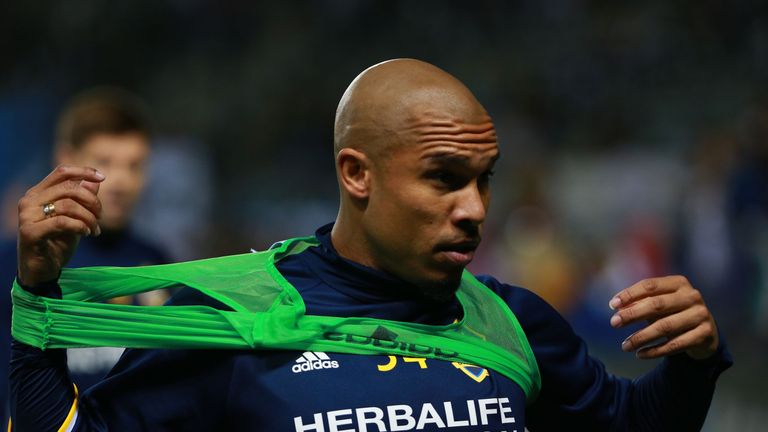 CARSON, CA - MARCH 06:  Nigel de Jong #34 of Los Angeles Galaxy puts on a practice jersey during warm up prior to their MLS match against D.C. United at St