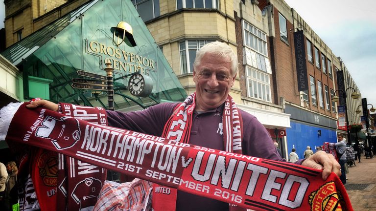 Man selling matchday scarves, Northampton Town v Manchester United, EFL Cup