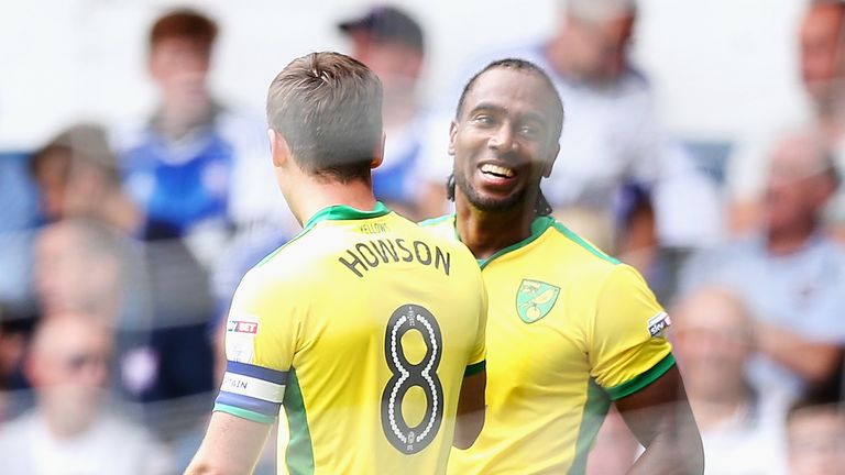 IPSWICH, ENGLAND - AUGUST 21:  Cameron Jerome of Norwich City celebrates scoring the opening goal with Jonathan Howson during the Sky Bet Championship matc