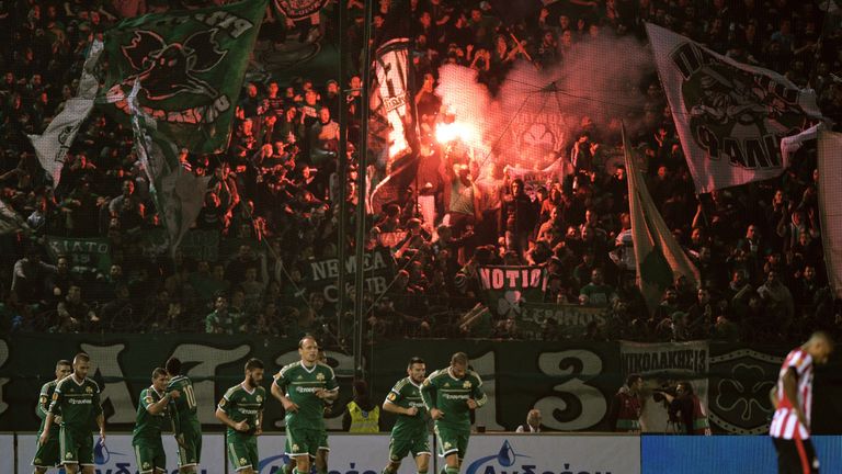 Panathinaikos Athens  players and fans celebrate their goal against PSV Eindhoven  during their Group E UEFA Europa League match in November 2014