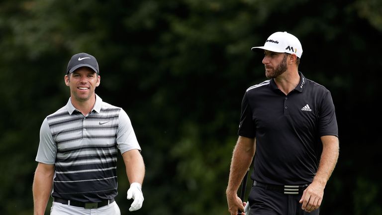 CARMEL, IN - SEPTEMBER 10:  Paul Casey of England (L) and Dustin Johnson (R) walk down the fourth fairway during the third round of the BMW Championship at