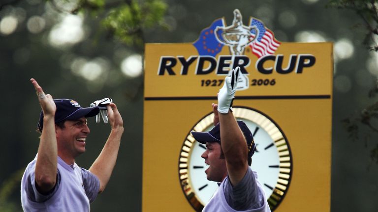 KILDARE, IRELAND - SEPTEMBER 23: Paul Casey (R) of Europe celebrates his hole in one on the 14th hole with team mate David Howell during the afternoon four