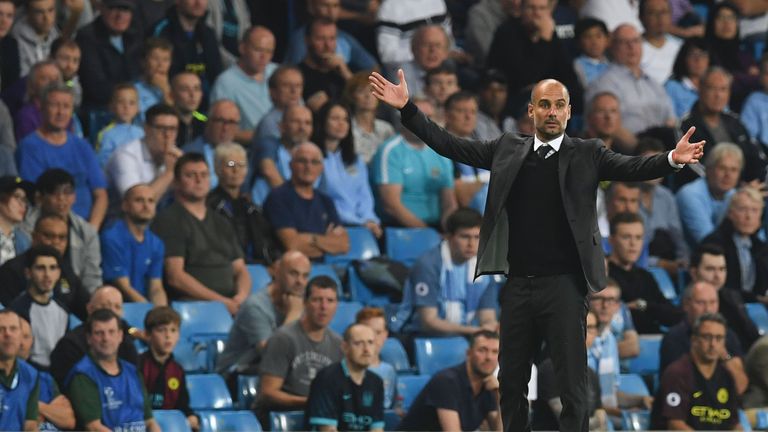 Manchester City&#39;s Spanish manager Pep Guardiola gestures on the touchline during the UEFA Champions League group C football match between Manchester City a