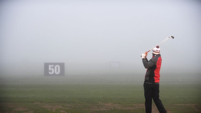 PASSAU, GERMANY - SEPTEMBER 22: Peter Uihlein of USA warms up on the driving range during a fog delay of the first round of the Porsche European Open at Go