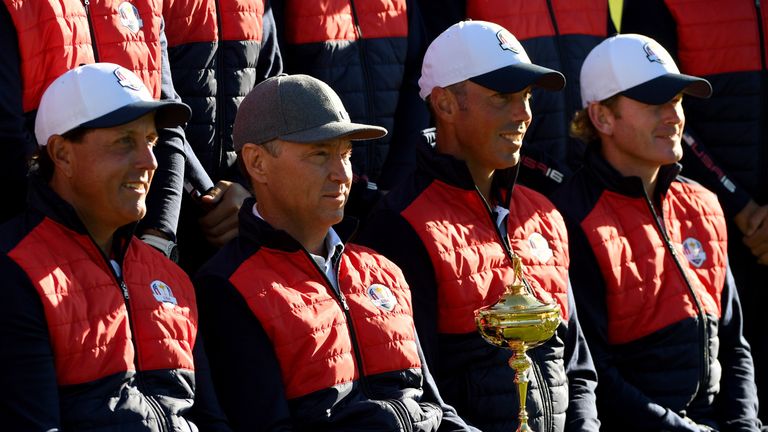 Captain Davis Love III (2nd R), Phil Mickelson, Matt Kuchar and Brandt Snedeker pose during team photocalls prior to the 2016 Ryder Cup