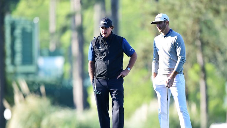 Mickelson and Johnson enjoy a practice round together at Augusta National earlier this year