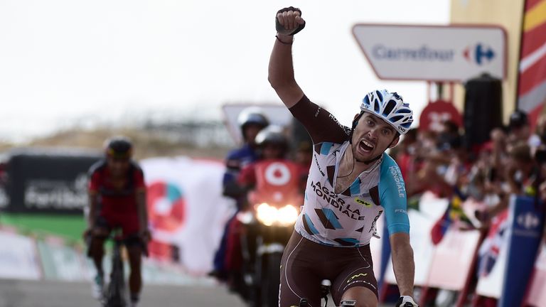 AG2R La Mondiale's French cyclist Pierre Latour celebrates winning as he crosses the finish line during the 20th stage of the 71st edition of "La Vuelta" T
