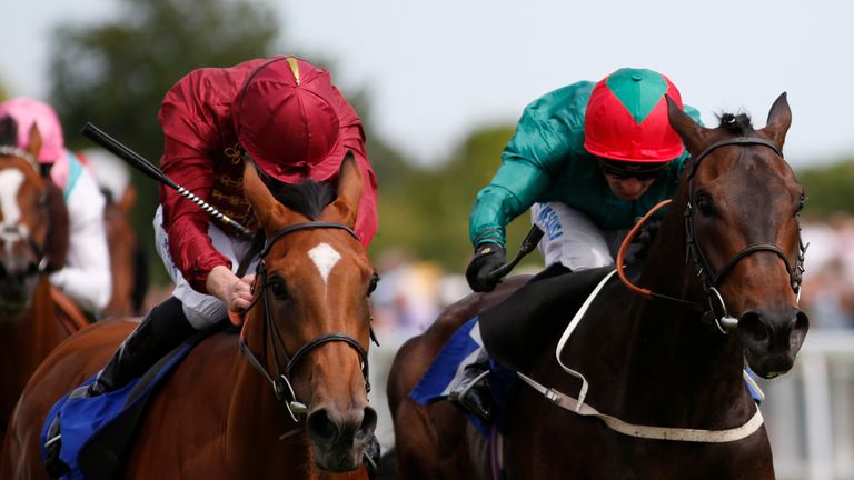 Oisin Murphy riding Simple Verse (L) win The Ashbrittle Stud Bibury Cup from Polarisation (R) at Salisbury