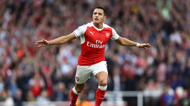 Alexis Sanchez celebrates scoring against Chelsea at the Emirates Stadium