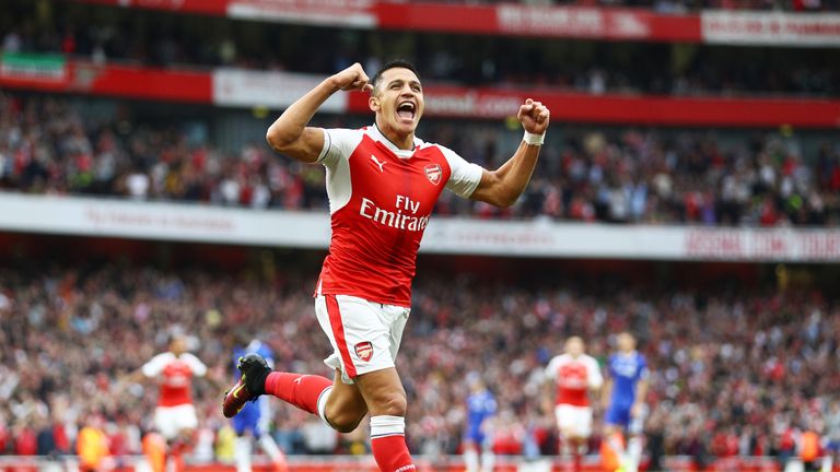 Alexis Sanchez celebrates scoring the opening goal of the game